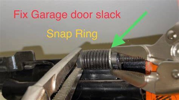 How much slack should be in garage door chain